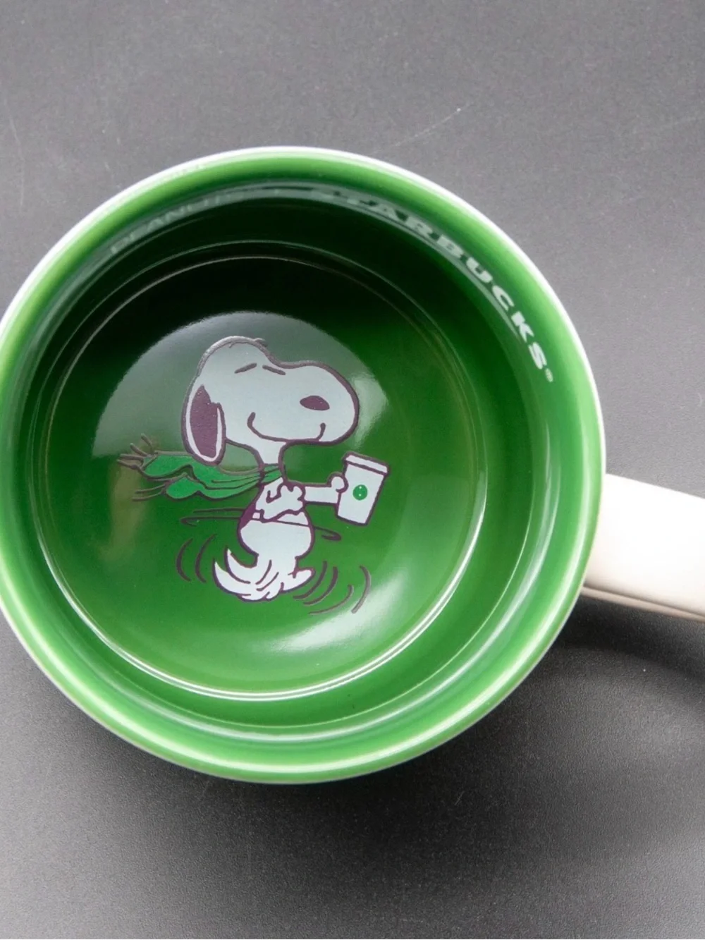 Starbucks Peanuts Ceramic Mug in White and Green with Colorful Character Print